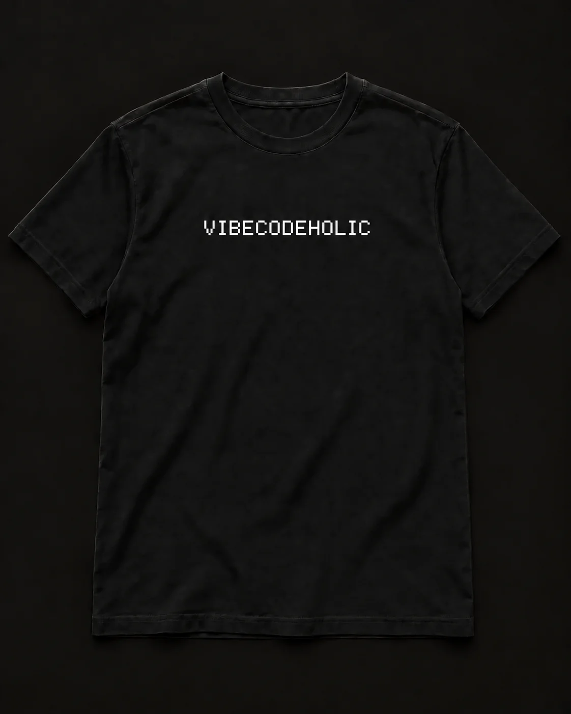 Black tee with the white VIBECODEHOLIC wordmark on one line